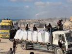 140-truk-bantuan-memasuki-Gaza.jpg